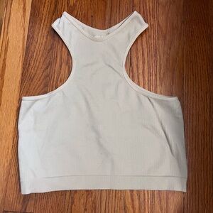 Beige athletic tank size small.